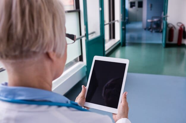 A close-up view of a medical professional using a tablet with an AI-powered diagnostic application. The screen displays detailed patient scans and potential diagnoses, highlighted by AI algorithms.